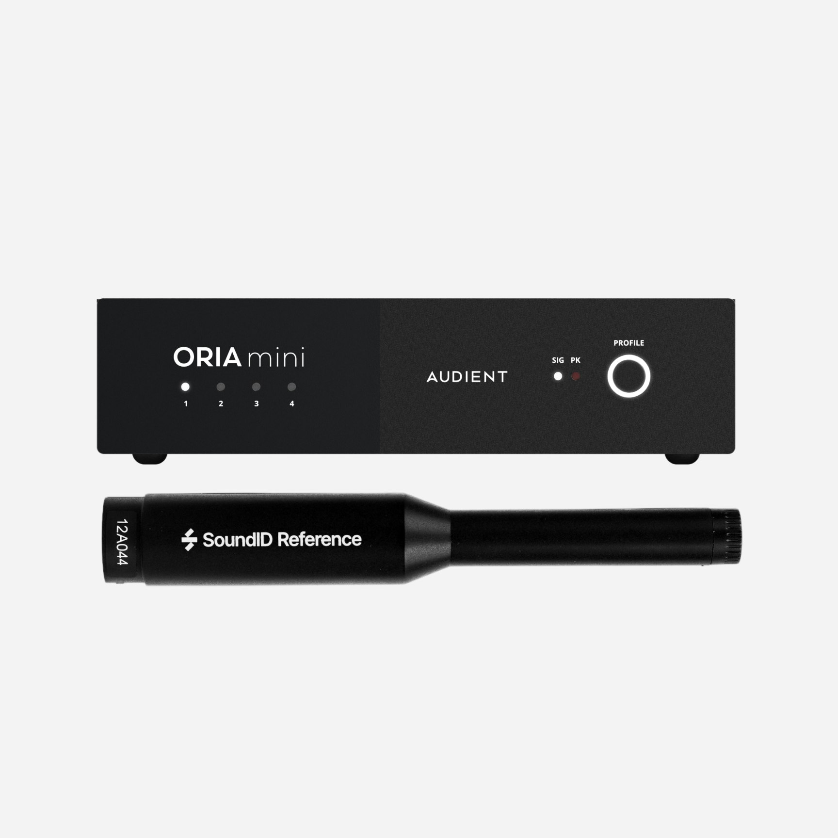 Audient ORIA Mini audio interface with illuminated profile knob shown above a SoundID Reference measurement microphone on light background.