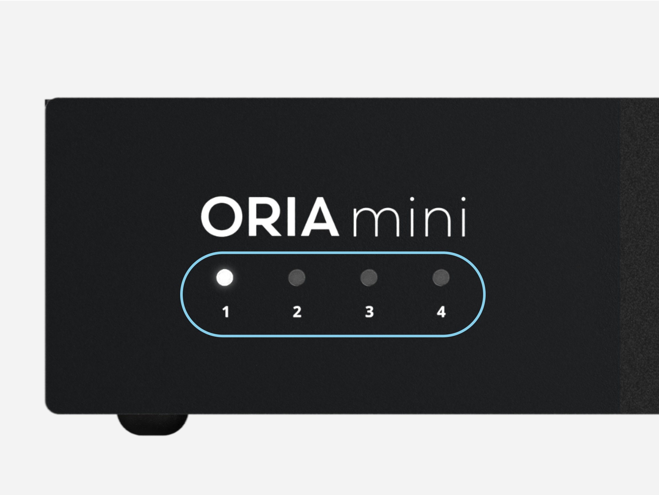 Close-up of Audient ORIA Mini front panel showing illuminated input channel one with white LED, minimalist black design.